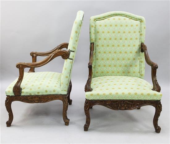 A pair of French carved beech fauteuils, H.3ft 11in.